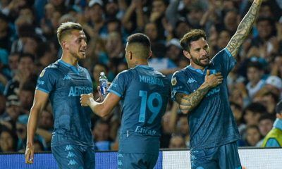 Racing único escolta de Boca