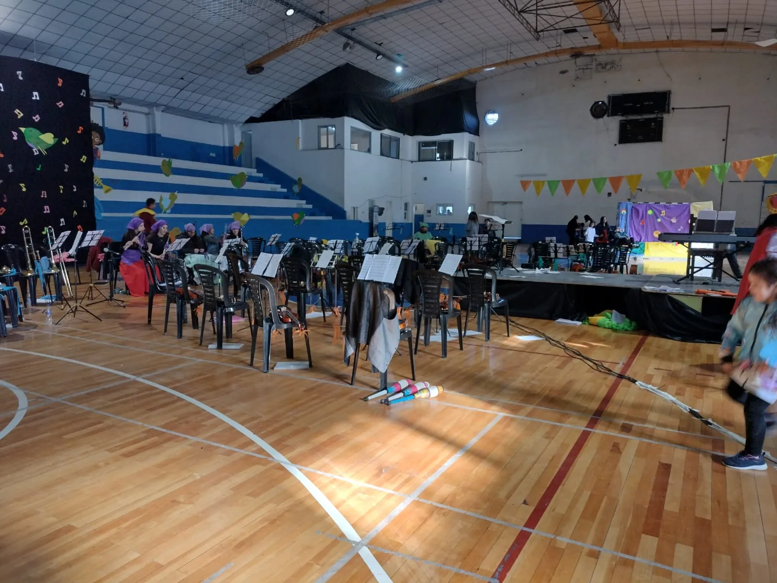Orquesta Infanto Juvenil, Barrio INTA, Trelew, música infantil, experiencias significativas, educación musical, Mariana Navarro, proyecto educativo, música clásica, niños y niñas, instrumentos musicales, educación en Chubut, cultura en Trelew, música para niños, formación musical