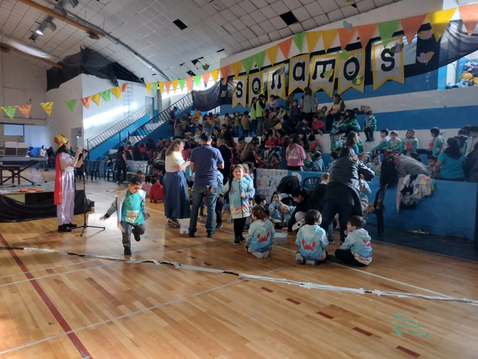 Orquesta Infanto Juvenil, Barrio INTA, Trelew, música infantil, experiencias significativas, educación musical, Mariana Navarro, proyecto educativo, música clásica, niños y niñas, instrumentos musicales, educación en Chubut, cultura en Trelew, música para niños, formación musical